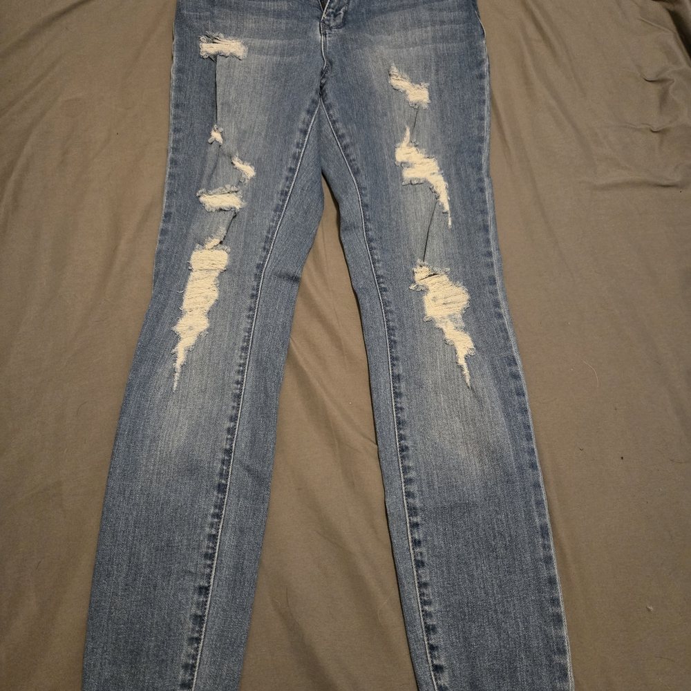 Trendy Distressed Skinny Jeans in Blue